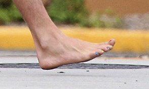 Liam Hemsworth has rainbow painted toenails 3 248CA9D300000578-0-image-m-3_1420843076235