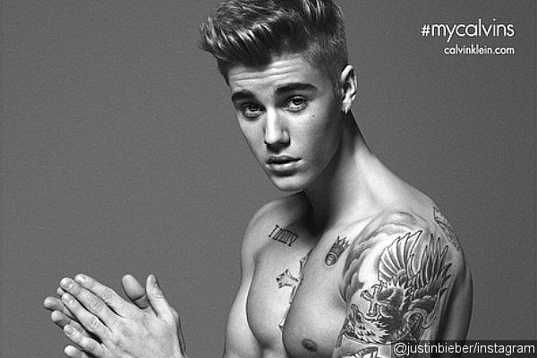 Justin Bieber is asking for trouble 5 justin-bieber-shows-off-washboard-abs-in-new-calvin-klein-ad