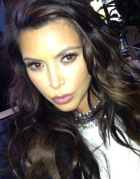 kim kiss face